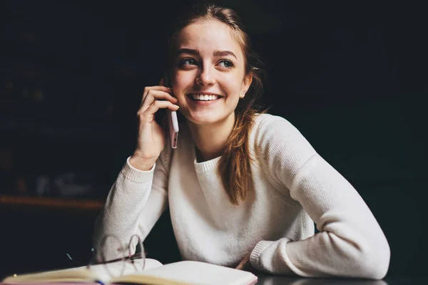 Cheerful Female Toothy Smile Looking Away Sitting Table Having Conversation — Fotografia de Stock