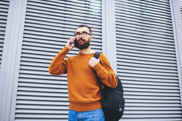 Bearded Male Casual Clothes Eyeglasses Looking Away Making Phone Call — Stockfoto