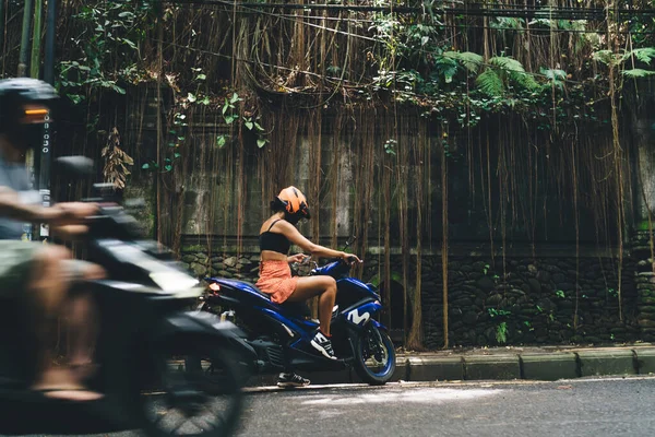 Side View Full Length Anonymous Female Biker Helmet Casual Clothes — Stockfoto