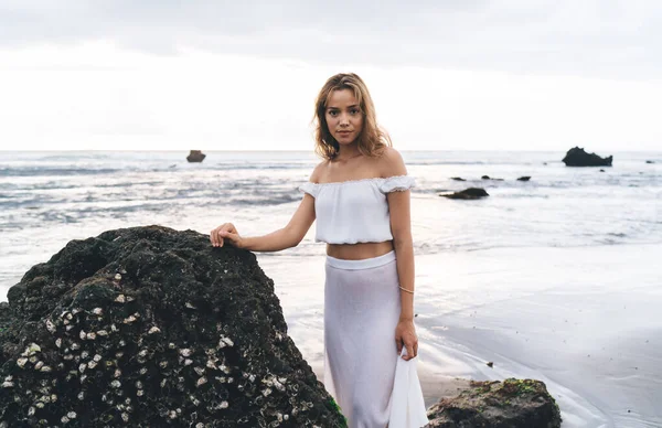 Female Brown Hair Open Shoulder White Top Skirt Standing Sandy — Stockfoto