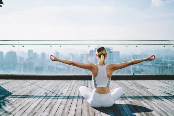 Back View Young Woman Sport Wear Practicing Yoga Taking Sukhasana — стокове фото