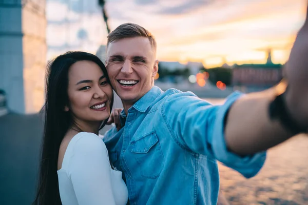 Young Happy Diverse Couple Casual Clothes Laughing While Taking Picture — Stockfoto