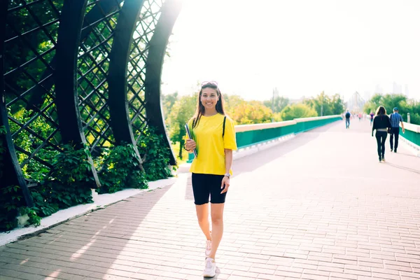 Full Body Backlit Cheerful Young Female Bright Top Looking Camera — Stock Photo, Image