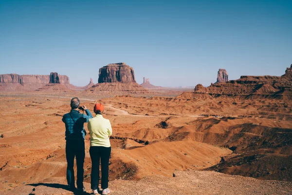 Back View Full Length Unrecognizable Senior Couple Enjoying Scenic Landscape Стокове Фото