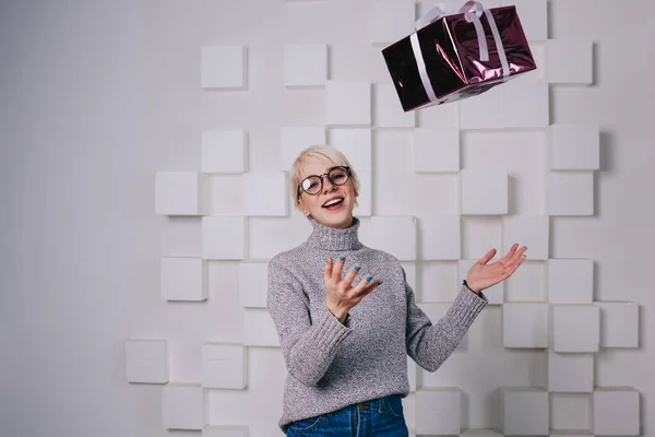 Positive Female Casual Clothes Eyeglasses Looking Camera Smiling While Tossing — Fotografia de Stock