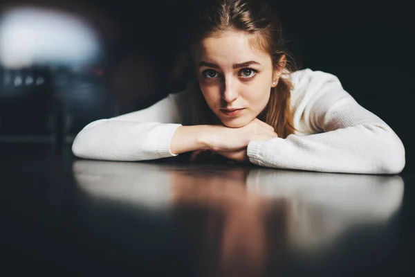 Young Pensive Female White Jumper Sitting Table Putting Head Hands — Stock Photo, Image