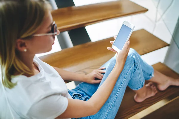 Crop Female Shirt Jeans Sitting Stairs Using Smartphone Communicating Friend — Stock Photo, Image