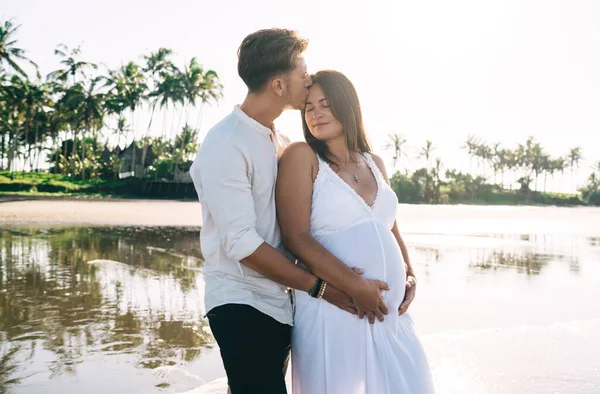 Side View Happy Pregnant Couple Summer Outfits Embracing Caressing Closed — Stock Photo, Image