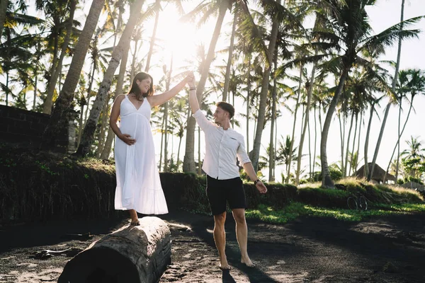 Full Length Young Pregnant Wife Walking Wooden Beam Holding Hand — Stockfoto