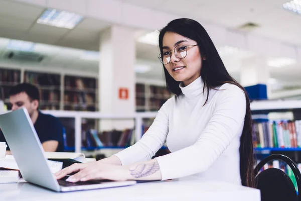 Confident Young Long Haired Asian Female Student Glasses Turtleneck Looking — Stockfoto