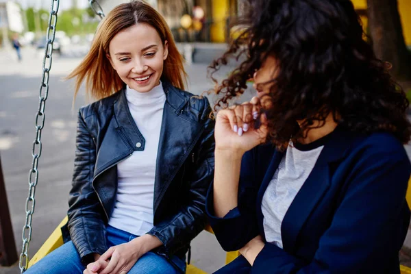 Positive Young Female Friends Casual Outfits Speaking Each Other Laughing — Stockfoto