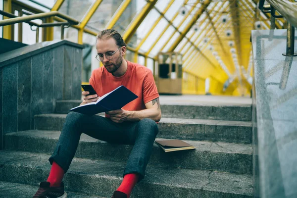 Serious Young Student Casual Wear Glasses Watching Smartphone Preparing University — Foto Stock