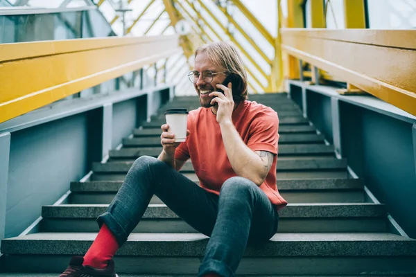 Cheerful Male Casual Clothes Glasses Drinking Coffee Using Cellphone Calling — Stockfoto