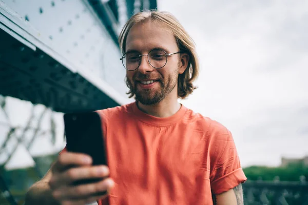 Cheerful Happy Bearded Man Glasses Long Hair Red Shirt Browsing — Stockfoto