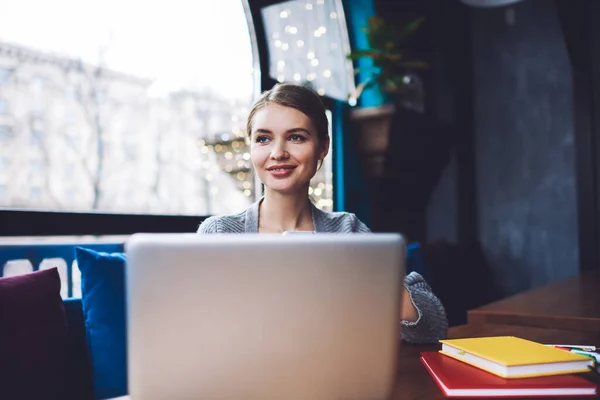 Positive Woman Entrepreneur Casual Clothes Browsing Laptop While Working Cafe — Fotografia de Stock