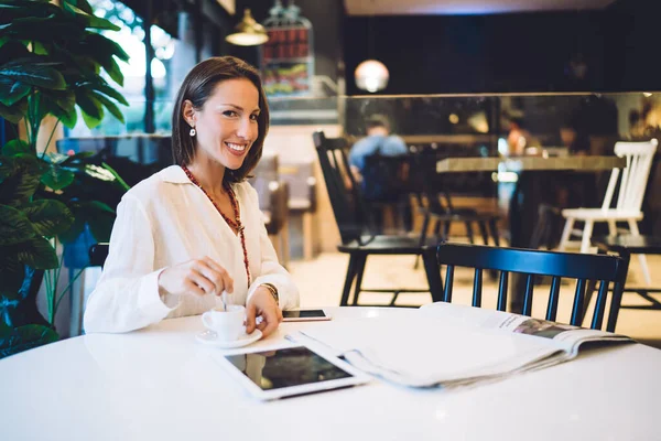 Positive Good Looking Mature Female Casual Wear Drinking Coffee While — Stock Photo, Image