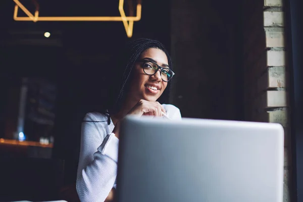 Low Angle Smiling African American Female Glasses Casual Clothes Sitting — Fotografia de Stock