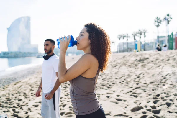 Hispanic Female Fitness Instructor Drinking Water Refreshing Workout Training Blurred — стоковое фото