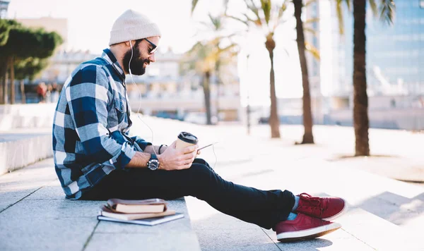 Young Bearded Man Listening Online Audio Book Browsing Website Digital — Stockfoto