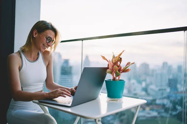 Young Smiling Blond Female White Top Trousers Typing Letter Laptop — Stock Photo, Image