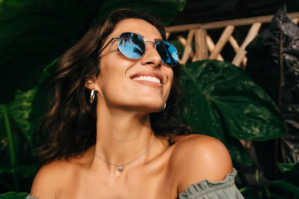 Portrait Cheerful Tanned Young Ethnic Brunette Sunglasses Smiling Looking Away — стоковое фото