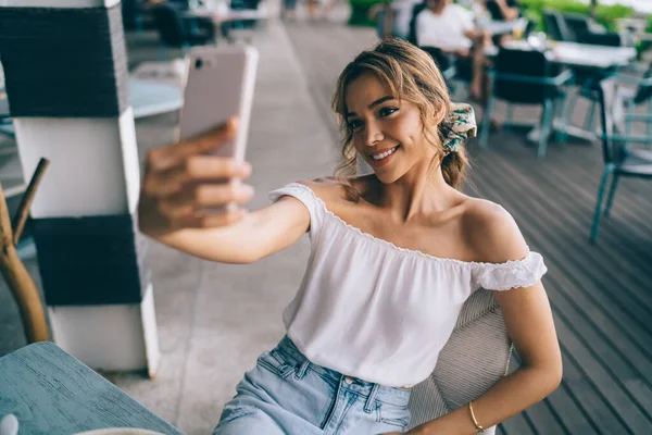 Cheerful Young Female Trendy Outfit Smiling Taking Selfie Mobile Phone — Stockfoto