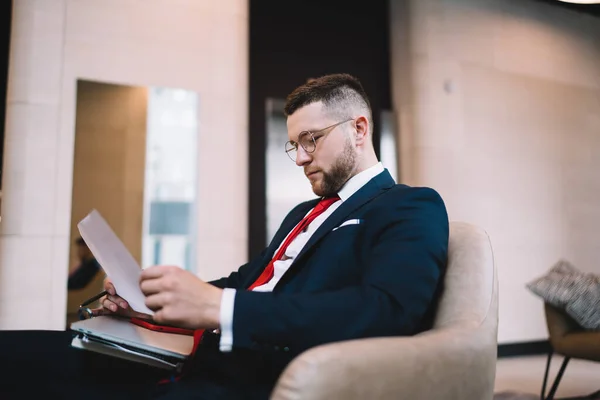 Side View Corporate Lawyer Suit Glasses Sitting Armchair Reading Contract — Stockfoto