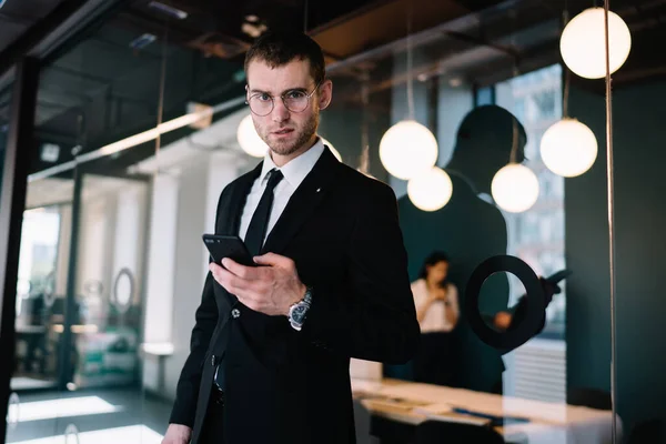 Insolent Young Businessman Wearing Formal Suit Browsing Mobile Phone Looking — Zdjęcie stockowe
