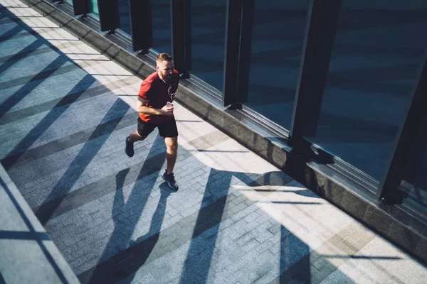 Full Body Sportsman Sneakers Running Phone Earphones While Training Early — Zdjęcie stockowe