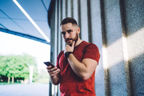 Serious Bearded Male Wearing Casual Clothes Wristwatch Surfing Mobile Phone — Stock Photo, Image