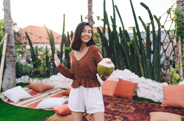 Young Ethnic Lady Summer Blouse Shorts Enjoying Fresh Coconut Water — Stock Photo, Image