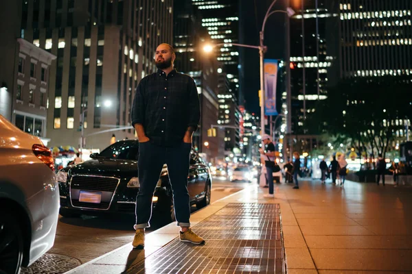 Modern Confident Hipster Standing Hands Pockets Cars Road Crowded Street — Stock fotografie