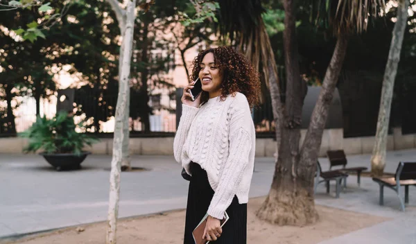 Positive Dark Haired Black Female Notebook Hand Standing Smartphone Street — стоковое фото