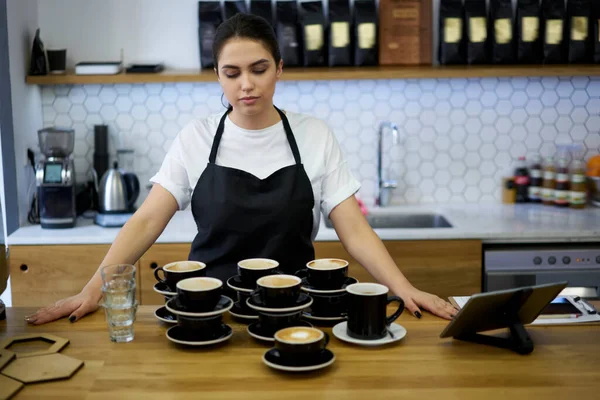 Serious Female Employee Cashier Counting Mugs Cappuccino Checking Ordering Bar — Foto de Stock