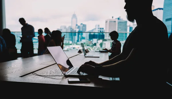 Side View Crop Anonymous Bearded Male Worker Sitting Table Typing — 图库照片