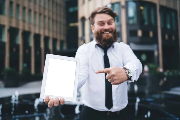 Cheerful Man Shirt Tie Pointing White Empty Tablet Screen While — Fotografia de Stock