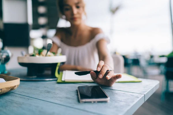 Selective Focus Modern Smartphone Wooden Table Blurred Woman Using Device — Stockfoto