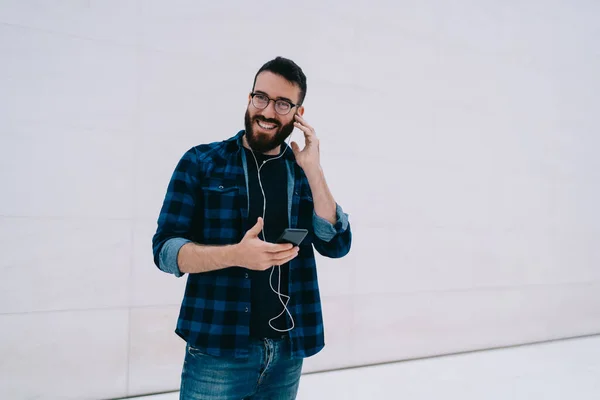 Half Length Portrait Cheerful Hipster Guy Optical Eyewear Using Cellphone — Stock Photo, Image
