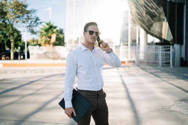 Serious Male Entrepreneur Formal Wear Sunglasses Communicating Phone While Standing — Stockfoto