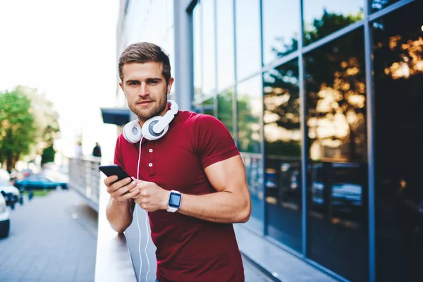 Cheerful Smiling Unshaven Guy Dressed Casual Outfit Standing Headphones Neck — Stockfoto