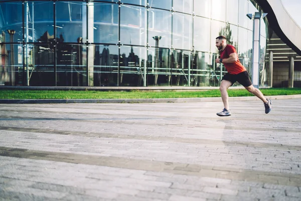 Side View Bearded Male Runner Activewear Running Fast Pavement Modern — стоковое фото