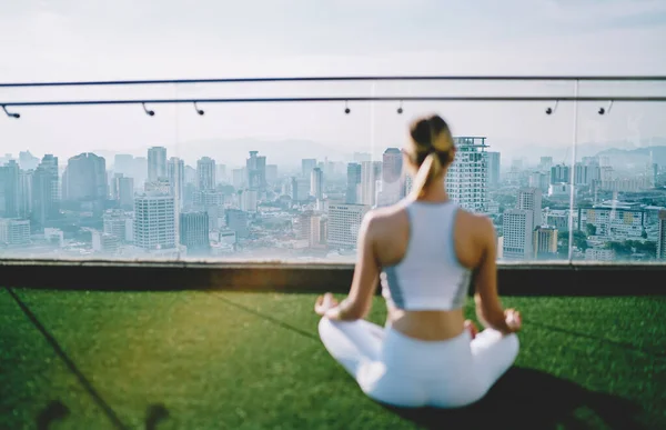 Back View Young Woman Practicing Yoga Taking Sukhasana Green Roof — ストック写真