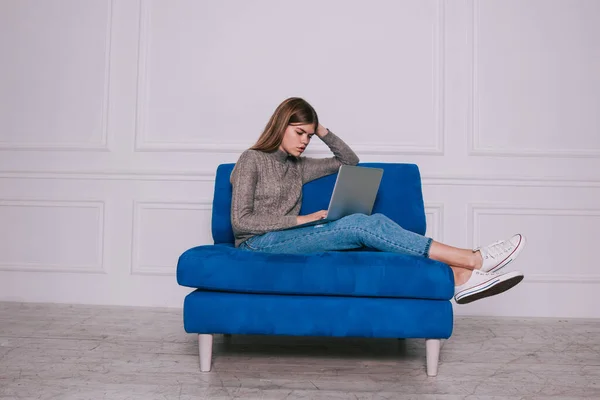 Thoughtful Female Freelancer Sweater Jeans Looking Screen Netbook While Sitting — Photo