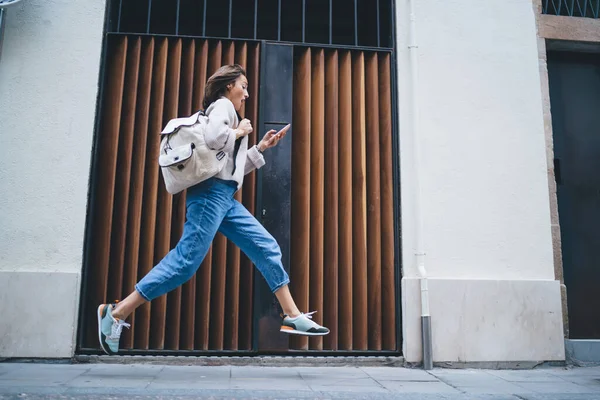 Low Angle Full Body Anxious Woman Casual Clothes Backpack Checking — Stock Photo, Image