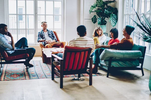 Young Multiracial Men Women Laughing Talking Each Other While Sitting — Stock Photo, Image