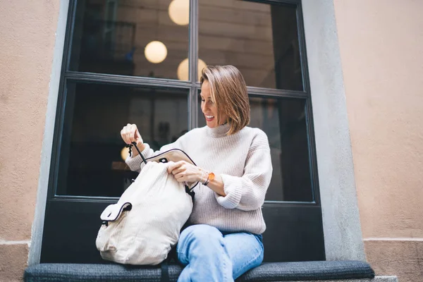 Carefree Female Tourist Searching Some Stuff Rucksack Enjoying International Vacations — Stock Photo, Image