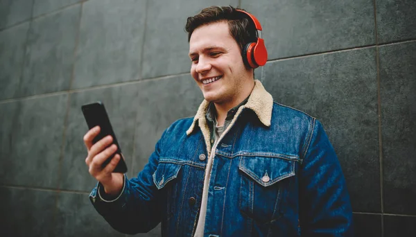 Wide Angle Young Male Toothy Smile Using Mobile Phone Having — Stock Photo, Image