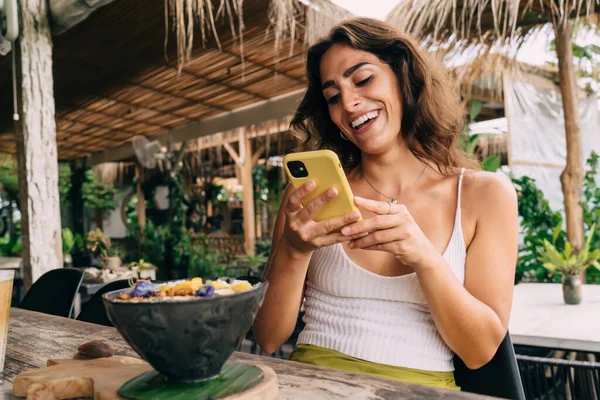 Delighted Smiling Female White Top Surfing Internet Modern Mobile Phone — Stock fotografie