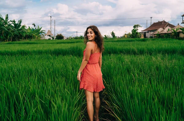 Smiling Ethnic Female Walking Countryside Grassy Field Bali Summer Day — Stock Fotó