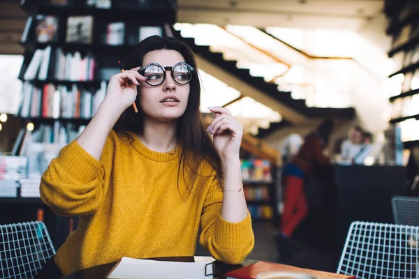 Calm Female Freelancer Rearranging Eyeglasses Making Notes Business Strategy While — Stock Photo, Image
